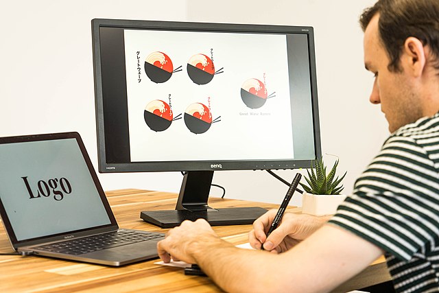 some guy doing photoshop